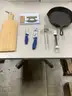 Lot of misc box items-17 1/2 inch Sterling cutting board, 11 inch frying pan, Alaskan knife, silver meat tenderizer,  DH