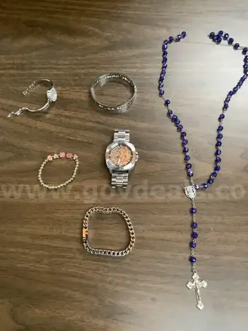 Lot of misc box items-silver Anne Klein watch, Jesus cross necklace, Sammy wrist band, silver Fossil watch,  &#x22;DH&#x22;