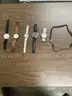 Lot of misc box items-Brown leather Skagen watch, white leather Nine West watch, Burberry watch, Swatch watch,  &#x22;DH&#x22;