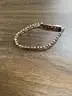 Lot of misc box items-Light tan leather belt, 2 gold earrings, Jones New York watch, snap on purse,  &#x22;DH&#x22;