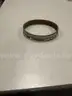 Lot of misc box items-Blue rocks wrist band, gold silver diamond wrist band, silver Dinosaur necklace,  &#x22;DH&#x22;