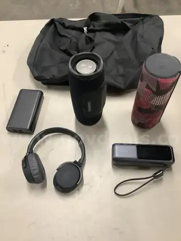 Lot of misc box items-JBL &#x22;Charge 4&#x22; speakers (IT TURNS ON) Anker 165W portable battery, &#x22;UE&#x22; speakers,  &#x22;DH&#x22;