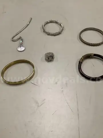 Lot of misc box items-Silver ring, gold roman numerals wrist band, &#x22;L&#x22; diamond piece,  &#x22;DH&#x22;