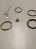 Lot of misc box items-Silver ring, gold roman numerals wrist band, &#x22;L&#x22; diamond piece,  &#x22;DH&#x22;