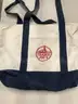 Lot of misc box items-Oakton Family bag, Trader Joe&#x27;s bag, Wilmington Trust bag, multi color striped purse, EY bag,  DH
