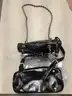 Lot of misc box items-Light brown leather purse, clear black purse, with an attached chain, pink Kipling bag,  &#x22;DH&#x22;