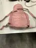 Lot of misc box items-Light brown leather purse, clear black purse, with an attached chain, pink Kipling bag,  &#x22;DH&#x22;