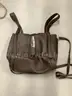 Lot of misc box items-Light brown leather purse, clear black purse, with an attached chain, pink Kipling bag,  &#x22;DH&#x22;