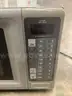 21 x 15 dark gray Amana microwave (IT DOES TURN ON)  &#x22;DH&#x22;
