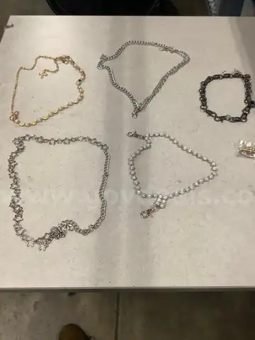 Lot of misc box items-Units Overseas pin, silver diamond rocks necklace, gold diamond cross necklace,  &#x201C;DH&#x201D;