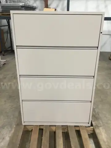 36 (L) x 20 (W) x 54 1/2 (H) tan four drawer metal filing cabinets, with brackets (NO KEY LOCKS)  “DH”