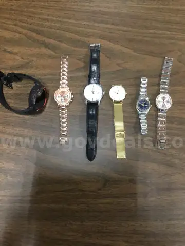 Lot of misc box items-gold Cluse watch, black &#x26; silver Citizen watches  &#x201C;DH&#x201D;