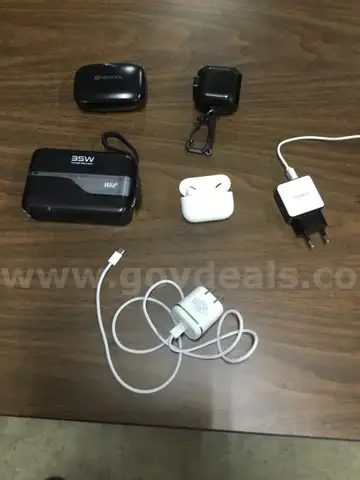 Lot of misc box items-W&P portable charger, Samsung earplugs, apple usb charger, Veatool earplugs  “DH”