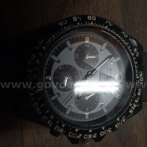 One Rolex Watch                  "JM"