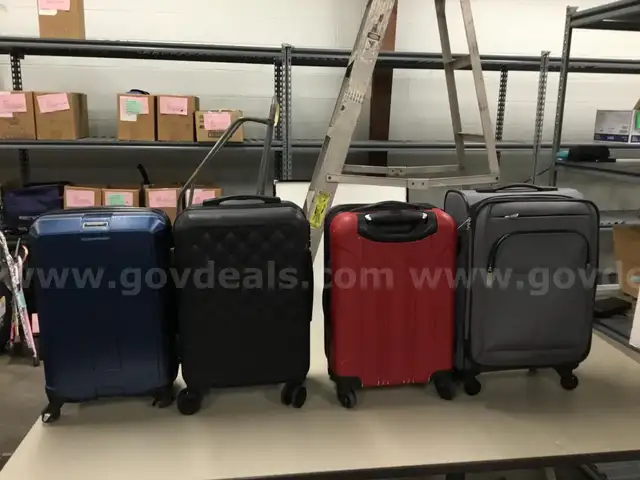 Four Assorted Carryon Luggage Bags w/handle and wheels                                                            “C”