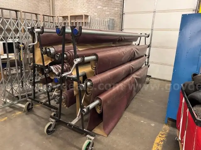 2 carts with floor covering material.