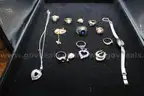 PAIR OF EARRINGS (1), CHARMS (6), WATCH (1), PIN (1), RINGS (8), NECKALACE (1)