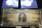 $ 20.00 (1) $1.00 Coin (19) Half Dollar (1) Misc. Coin (4)