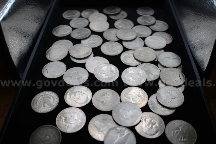$50 coin (1) $100 bill (1) $1.00 coin (52) $5.00 coin (1)