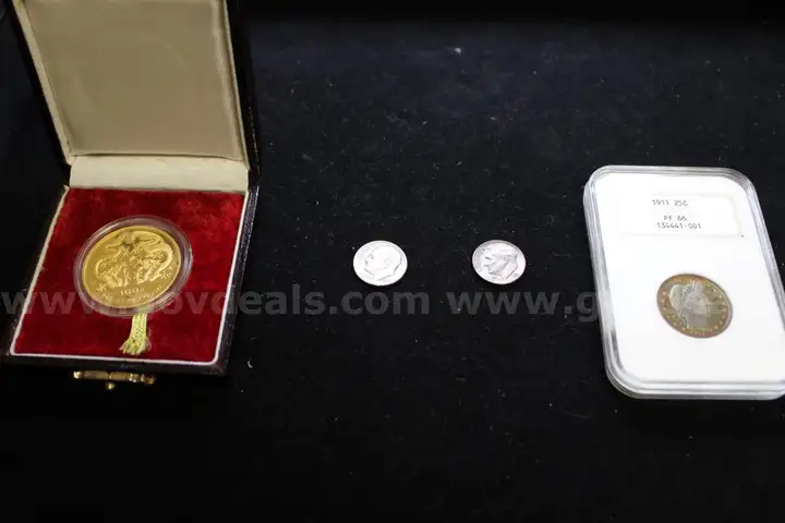 FOREIGN COIN (1); DIME (2); QUARTER (1)