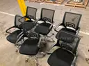 Lot of 7 rolling office chairs (1 needs repair)