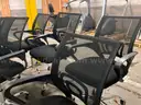 Lot of 7 rolling office chairs (1 needs repair)