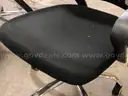 Lot of 7 rolling office chairs (1 needs repair)