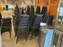 Lot of 53 stacking padded seat banquet chairs