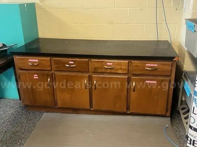 Floor cabinets with black countertop