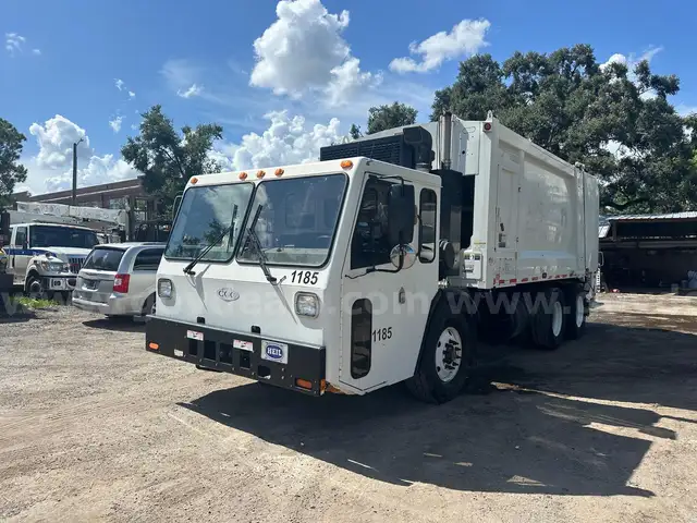 2013 Crane Carrier LE2 COE Heil 25 Cu Yard Rear Load Garbage Truck