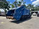 2013 Crane Carrier Co. Low Entry with Loadmaster Excel-S 25 Cu Yard Rear Load Garbage Truck
