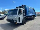 2013 Crane Carrier Co. Low Entry with Loadmaster Excel-S 25 Cu Yard Rear Load Garbage Truck
