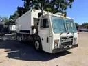 2015 Mack LEU600 with Heil T/A Rear Load Garbage Truck