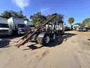 2000 Volvo WG  T/A Roll Off Truck