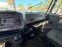 2000 Volvo WG  T/A Roll Off Truck