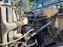 2000 Volvo WG  T/A Roll Off Truck
