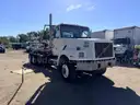 2000 Volvo WG  T/A Roll Off Truck
