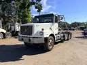 2000 Volvo WG  T/A Roll Off Truck