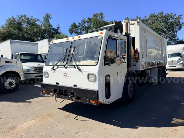 2013 Crane Carrier Co. Low Entry with Heil 32 Cu Yard Rear Load Garbage Truck