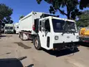 2013 Crane Carrier Co. Low Entry with Heil 32 Cu Yard Rear Load Garbage Truck