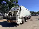 2013 Crane Carrier Co. Low Entry with Heil 32 Cu Yard Rear Load Garbage Truck