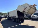 2013 Crane Carrier Co. Low Entry with Heil 32 Cu Yard Rear Load Garbage Truck