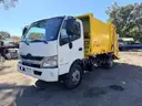 2016 Hino XJC710 / XFC710 with Heil Mini 9 Cu Yard Rear Load Garbage Truck