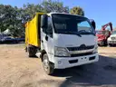 2016 Hino XJC710 / XFC710 with Heil Mini 9 Cu Yard Rear Load Garbage Truck
