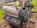 Hot water pressure and steam washing machine