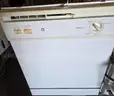 Four (4) NON working built in GE dishwashers (parts only)
