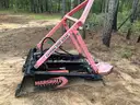 Marshall Tree saw Skid-steer attachment