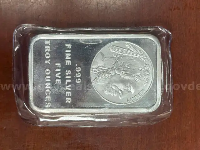 10troy ounces .999 pure silver (2-5ozt bars)