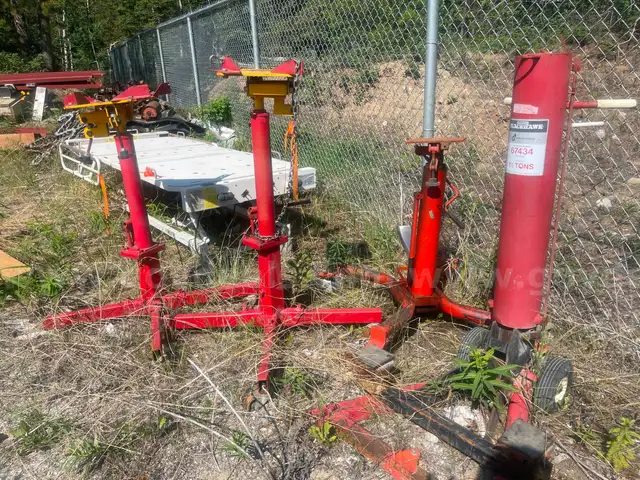 Four automotive service jacks