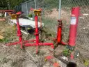 Four automotive service jacks